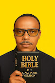 JOHN THATA holding a bible